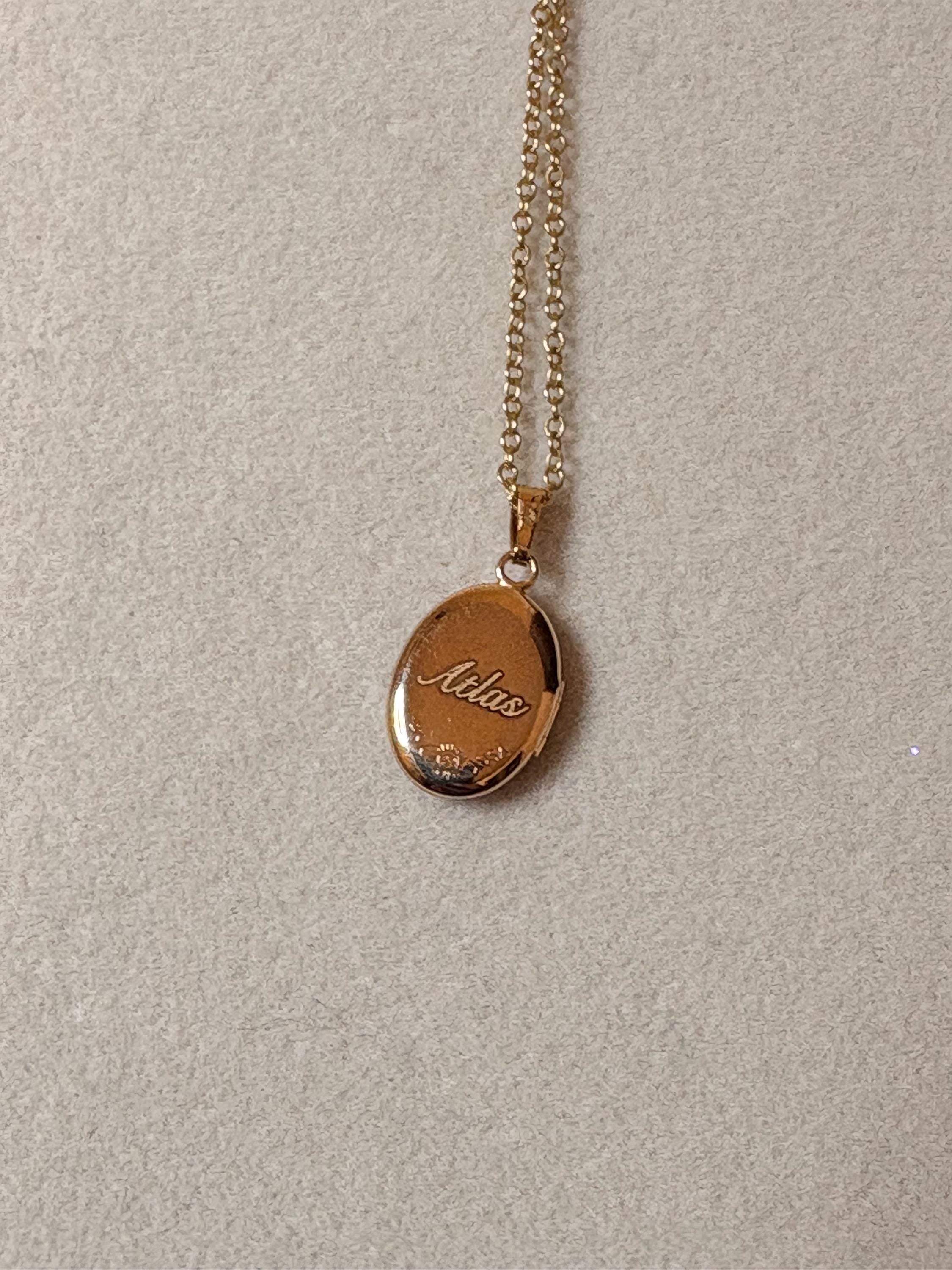 14kt Gold Oval Locket with Diamond Charm