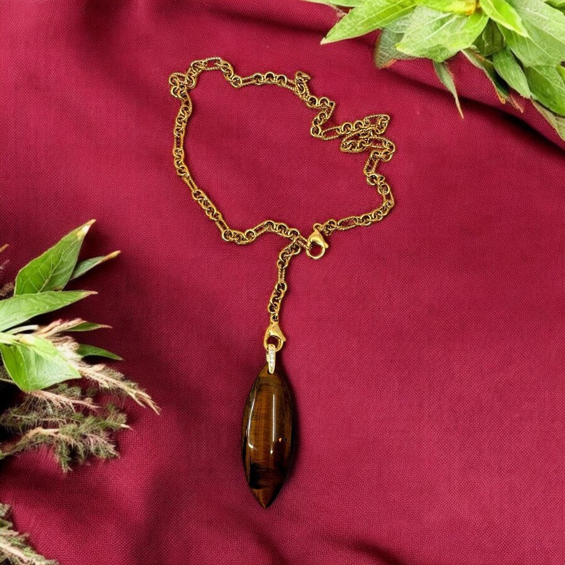 Tiger's Eye Pendant: Polished Stone with Gold Bail